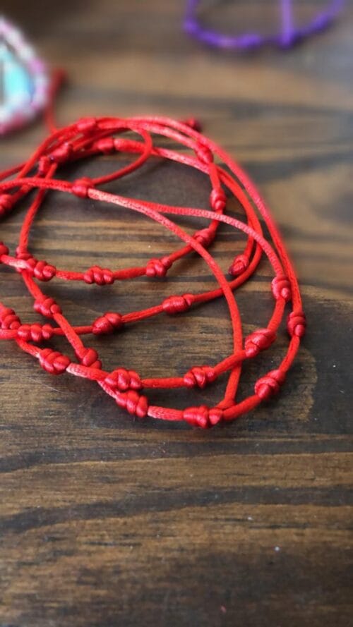 PULSERA 7 NUDOS ROJA
